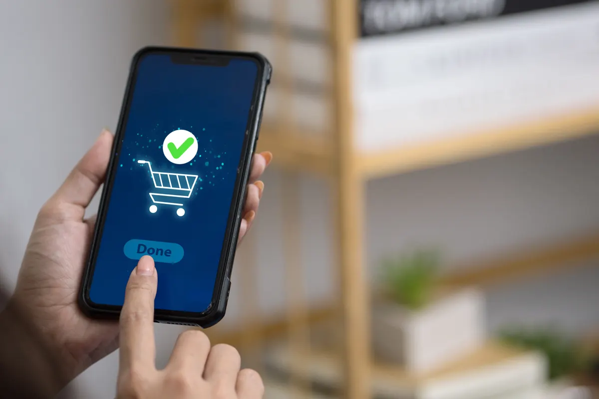 Checkout optimization: online shopping completed with mobile app checkout confirmation.
