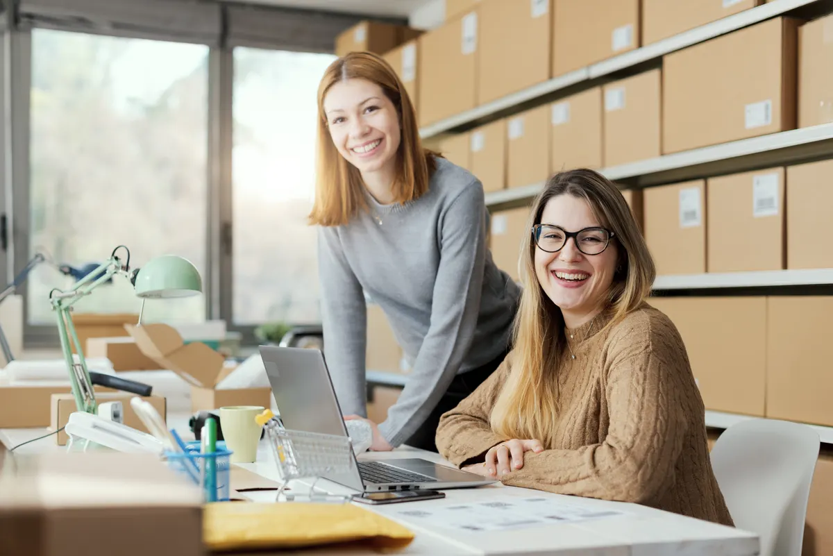 Performance max for ecommerce: e-commerce business owners working together in the store.