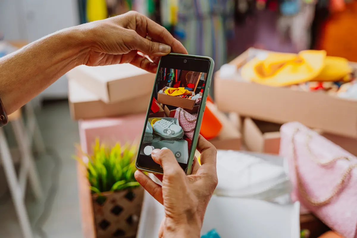 Product launch marketing: senior woman selling clothes and accessories online.