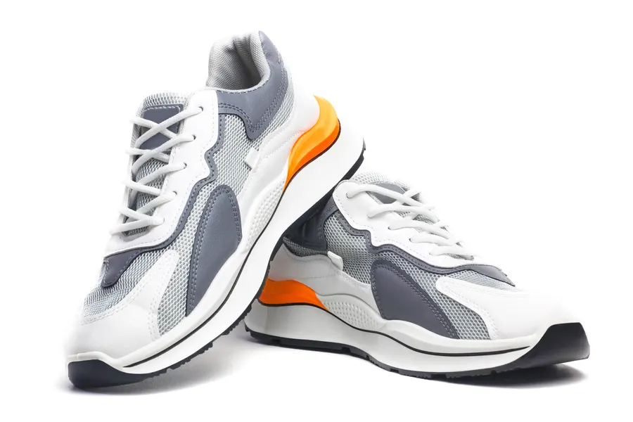 White running sneakers on a plain background, shown as an order in a sample store card