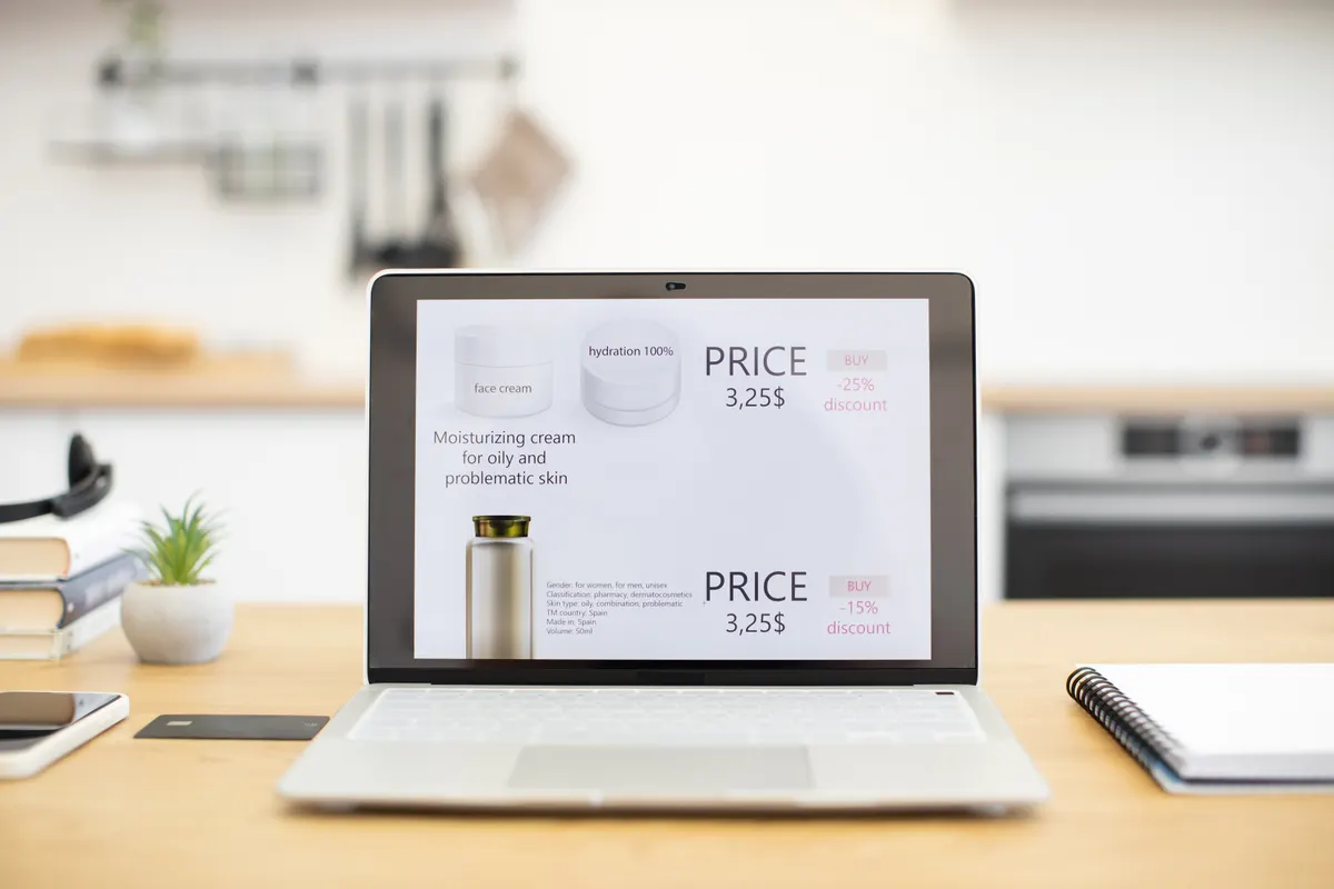 How AI crawlers read a product page: laptop displaying online cosmetics store with discount offers.