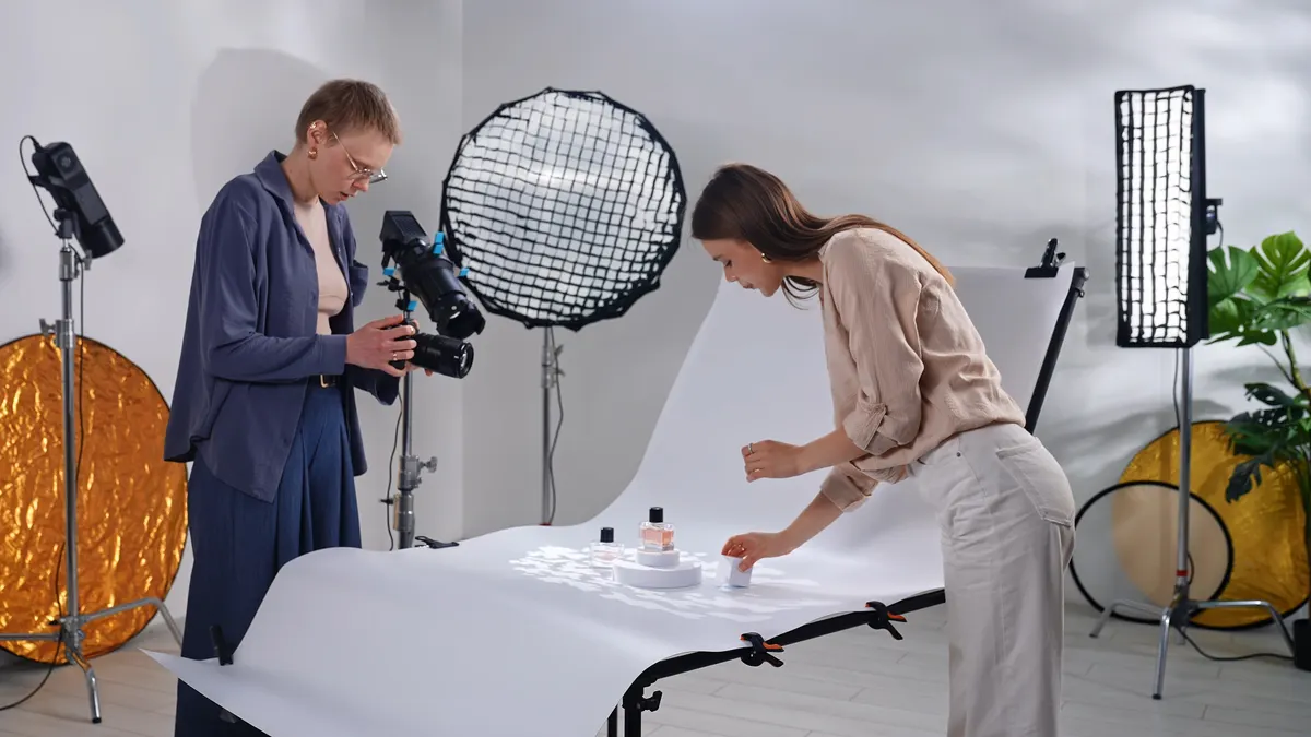 The Merchant Center errors we see most: photographer and Assistant Setting Up Perfume Photo Shoot.