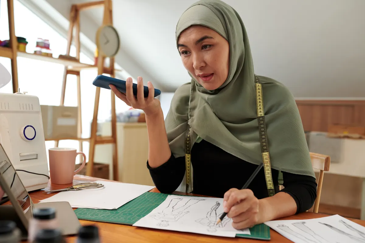 Modest fashion marketing agency: fashion Designer Recording Voice Message.