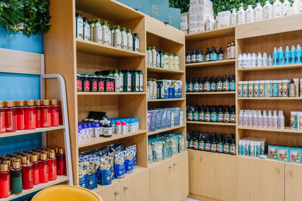 Packaging supply marketing agency: shelves filled with various health and beauty products in a retail store, showcasing a vibrant selection of bottles and packaging.