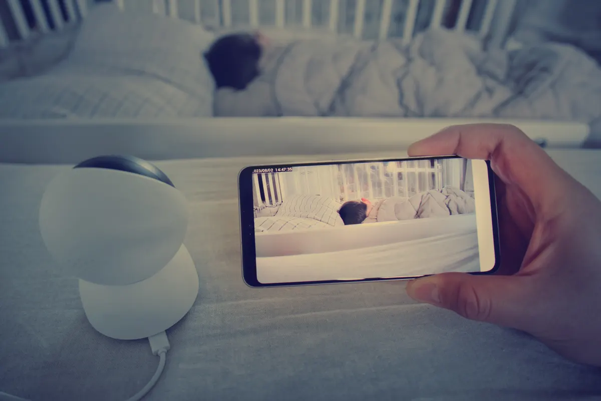 Baby monitor marketing agency: monitoring from the phone through the camera for a child sleeping in the room.