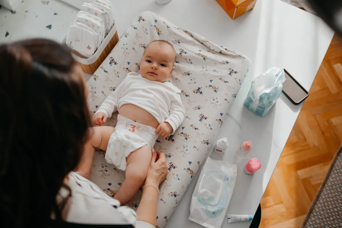 Diaper & wipe marketing agency: bonding with baby happens anytime even during a diaper change.