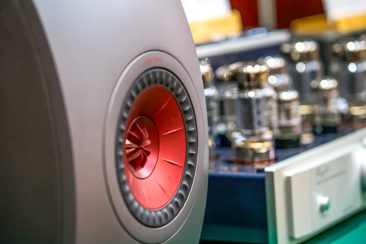 High-end audio marketing agency: expensive and luxurious high-end audiophile-grade wooden box metal diaphragm speakers.
