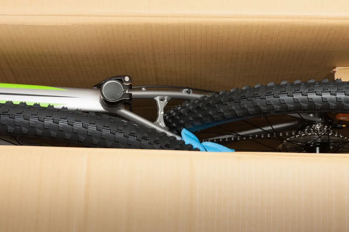 E-bike marketing agency: bike in paper box, photo from unboxing bike.