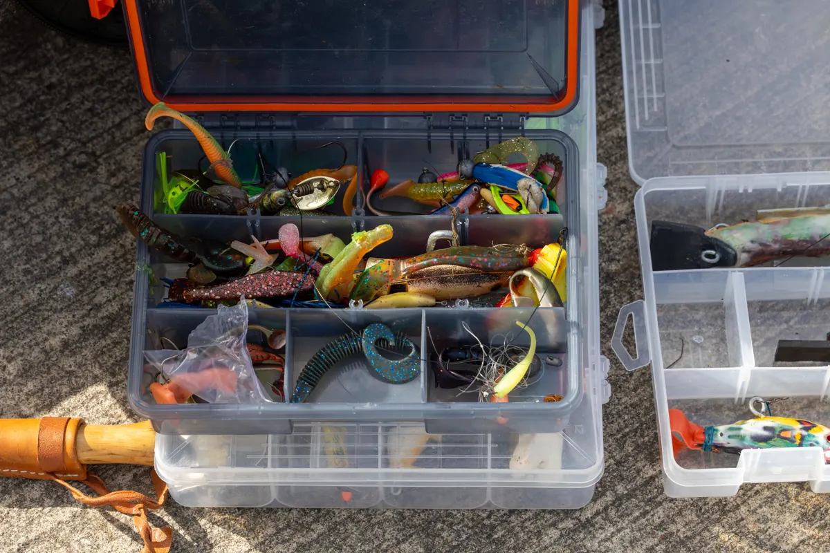 Fishing tackle marketing agency: stockholm, Sweden A box of fishing tackle on a pier.