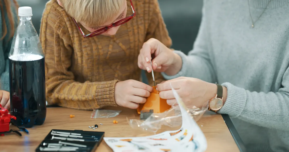 Kids' activity marketing agency: mother, son and building toys in house with tools, science project and bonding for child development. Mom, boy and kids robotics kit in living room with assistance, education and learning for growth.