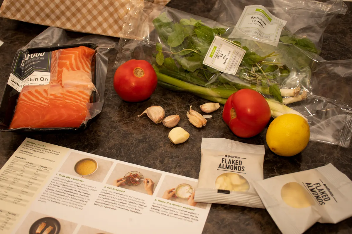 Meal subscription marketing agency: hello Fresh meal kit and recipe card on a kitchen countertop.