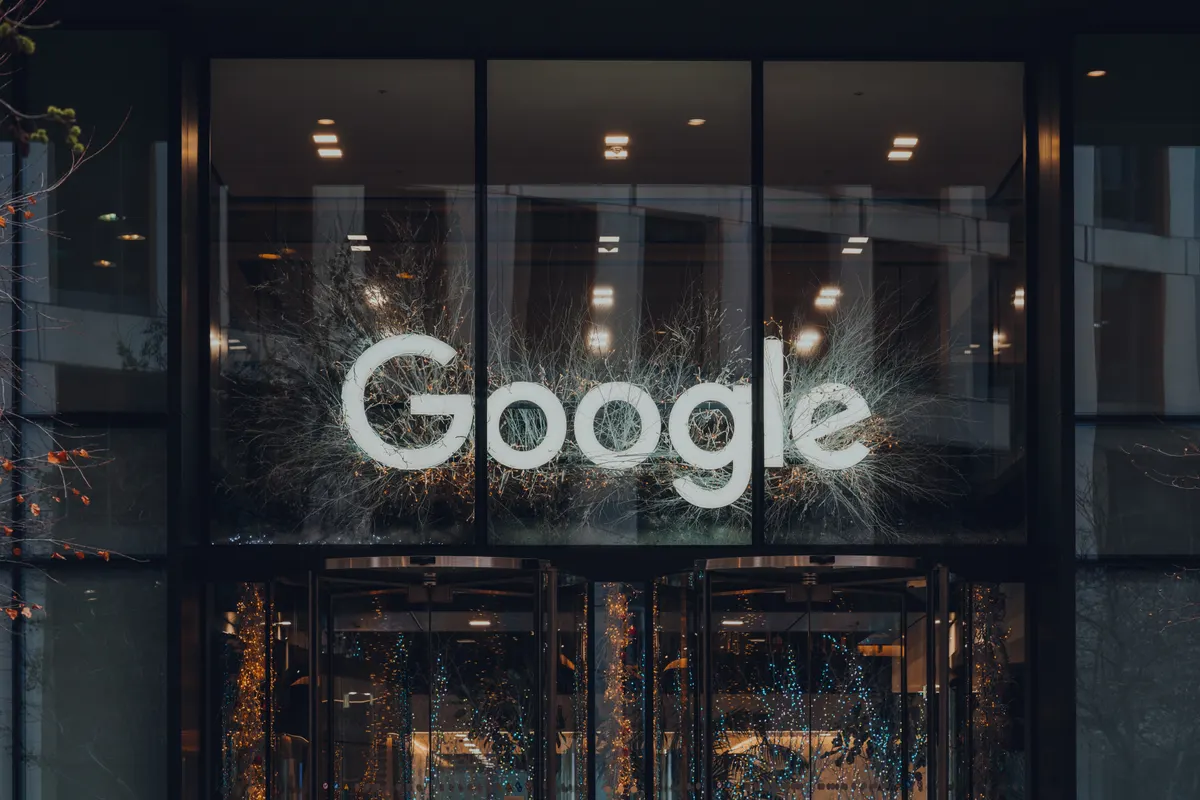 Google shopping ads agency: name sign above the entrance of Google offices in London, UK.