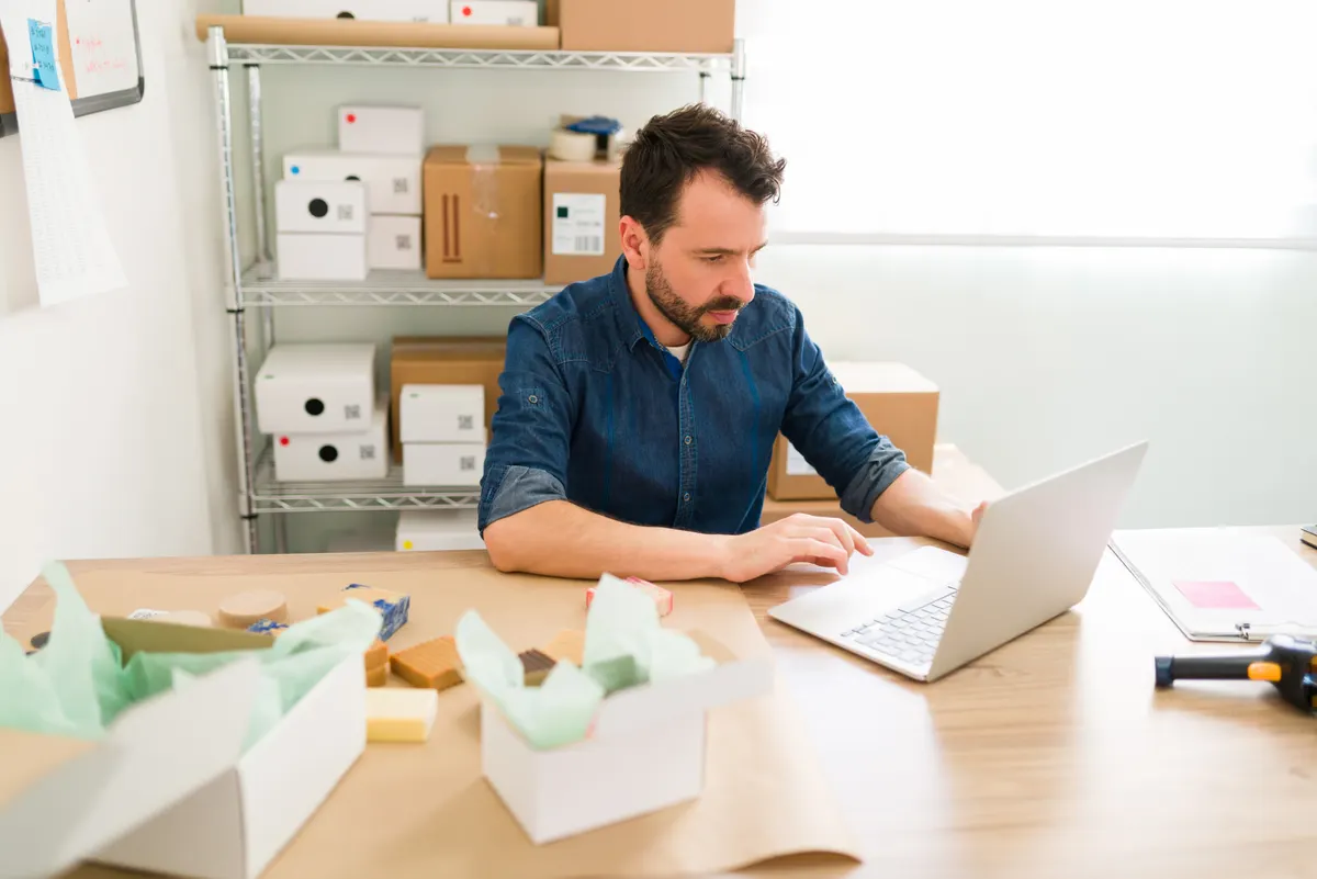 Klaviyo agency: focused business owner updating the online shop.